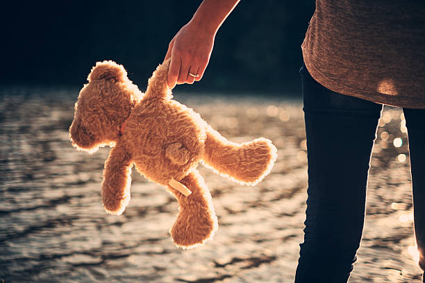 istock Teddy bear and pretty girl 537045959