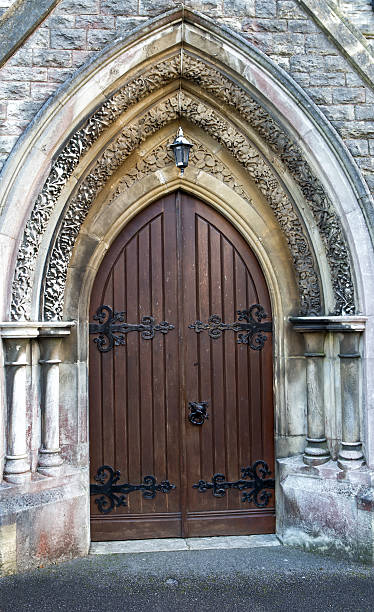 istock Wooden church door Gothic style 537046111