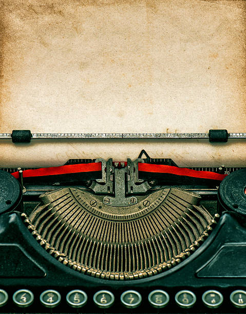 istock Vintage typewriter with textured grungy paper 537060205