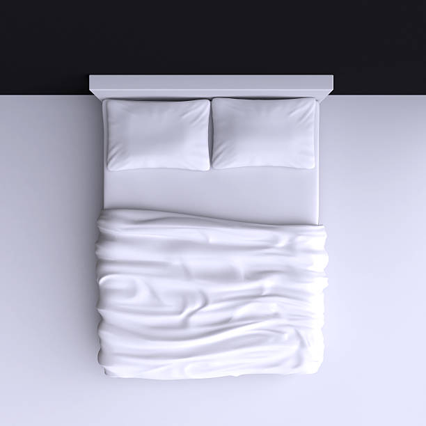 istock Bed with pillows and a blanket in the corner room, 537060389