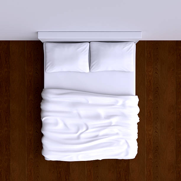 istock Bed with pillows and a blanket in the corner room, 537060415