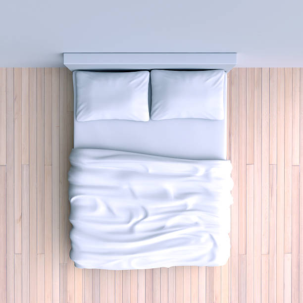 istock Bed with pillows and a blanket in the corner room, 537060419