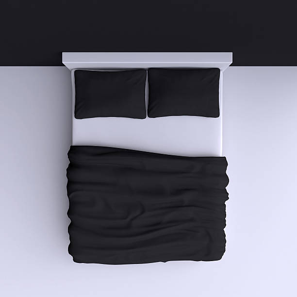 istock Bed with pillows and a blanket in the corner room, 537060431