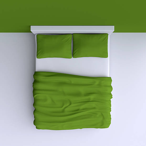 istock Bed with pillows and a blanket in the corner room, 537060821