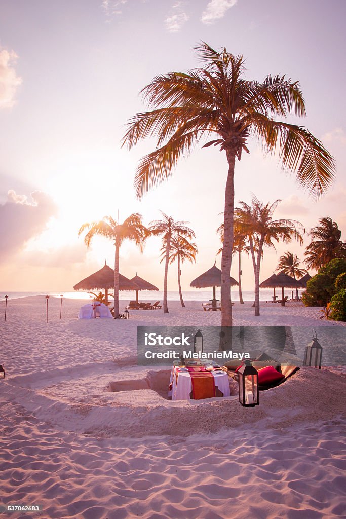 Tropical Candle Light Dinner by the Beach Tropical Luxury Candle Light Dinner with lots of romantic feeling by the Beach Beach Stock Photo