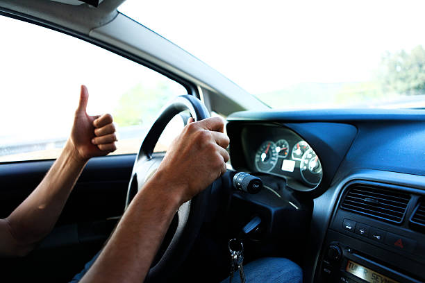 istock Hand sign OK a the car 537075620