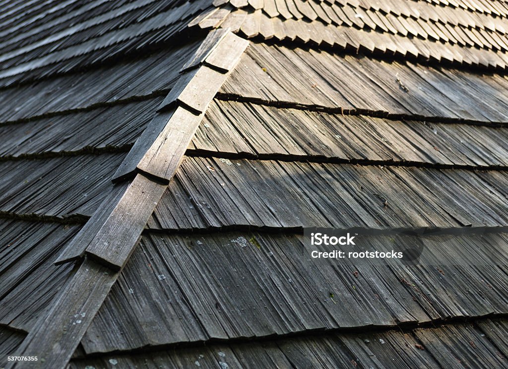 Old wooden shingle roof Old wooden shingle roof with rich texture. 2015 Stock Photo