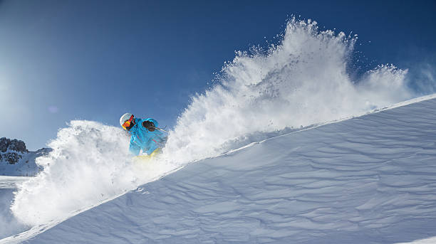 istock Skier skiing downhill in high mountains 537078247