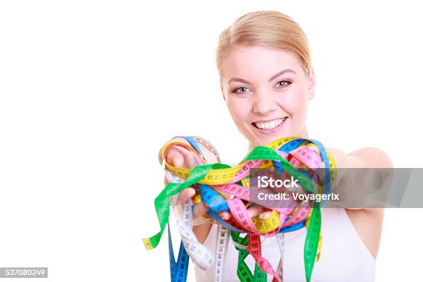 Fitness Woman Fit Girl Holding Colorful Measure Tapes Stock Photo - Download Image Now