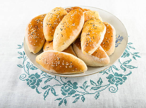 Russian and Ukrainian homemade pattys . Traditional Russian and Ukrainian homemade pattys with filling. brat burger stock pictures, royalty-free photos & images