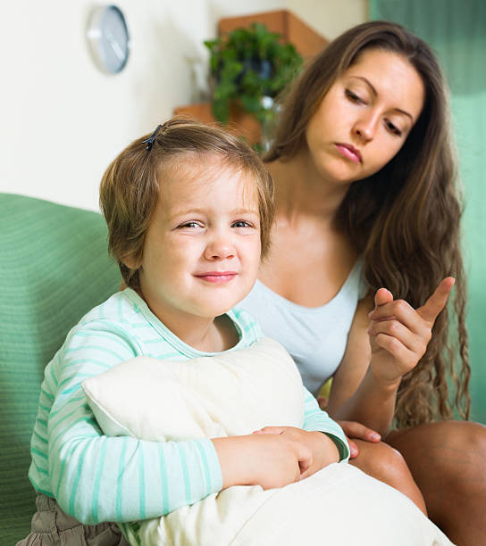 istock Woman scolding child at home 537093595