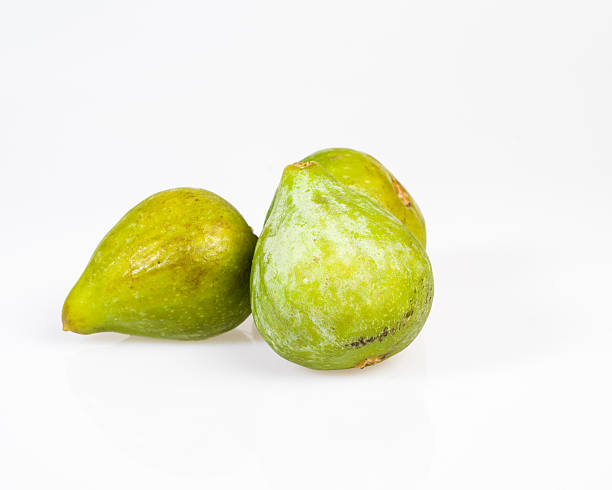 istock Fresh green figs picked ripe on white 537094383