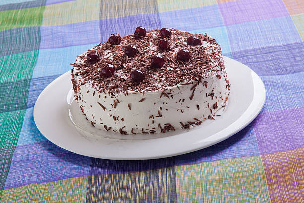 istock Cheesecake with fresh blueberries on white plate closeup 537096021