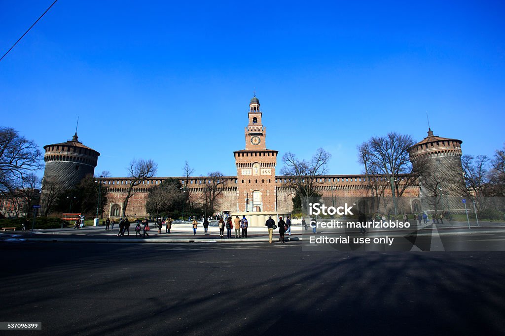 Sforzesco Castle Milan, Italy - Feburary 8, 2015: peolple walking in front of Castello Sforzesco, one of the main landmark of the italian town which will held the EXPO 2015 2015 Stock Photo