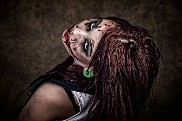 istock Young woman in zombie makeup looking back, closeup. 537096491