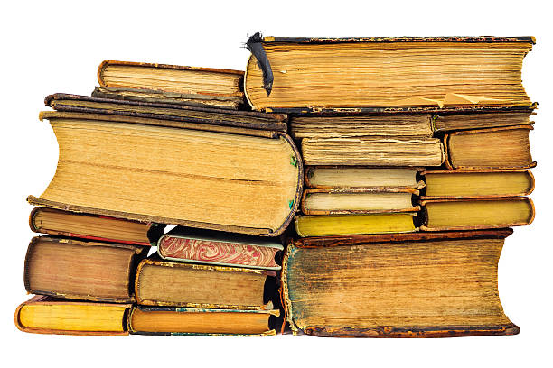 istock Pile of different old books isolated on white 537100631