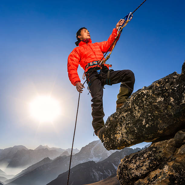 Man climbing on rock