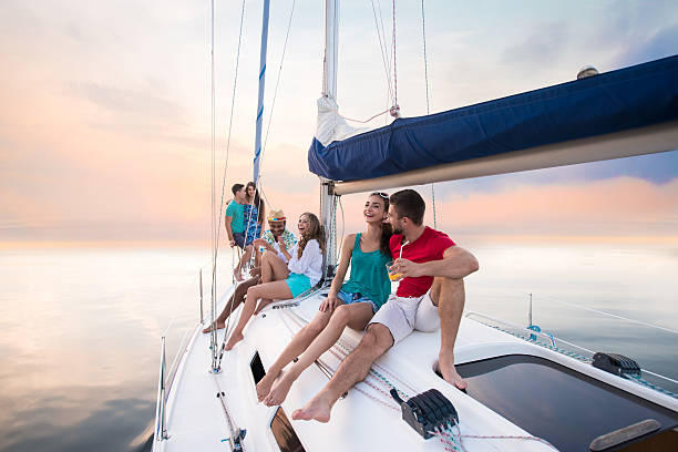 istock Young people sitting on yacht 537102020