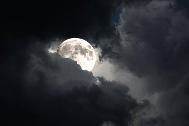 istock Full Moon is rising in the midnight sky 537110892