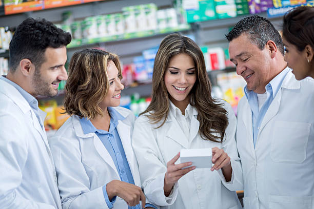 istock Group of pharmacists talking about new drugs 537115715