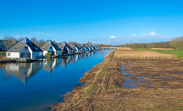 Houses floating in a canal