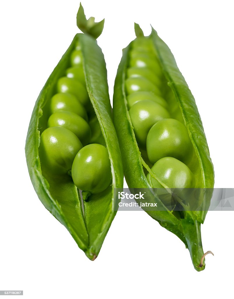 Peas in a green pod isolated Green peas in a pod isolated on white 2015 Stock Photo