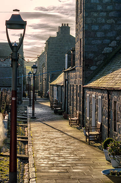 Aberdeen Cottages Footdee is an area of Aberdeen, Scotland known locally as "Fittie". It is an old fishing village. aberdeen scotland stock pictures, royalty-free photos & images