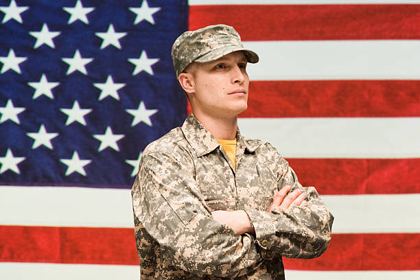 istock Soldier standing with arms crossed 537119968