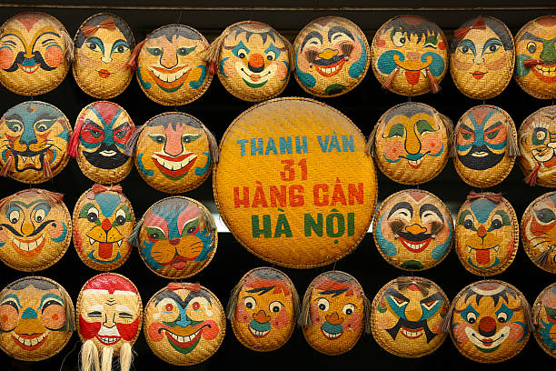 Hanoi, Vietnam - February 6, 2015: Traditional painted Face masks in a Hanoi market, Vietnam.