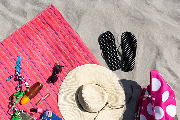 istock Top view of sandy beach with summer accessories 537153258
