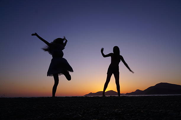 istock Young girls screaming on the beach. 537157432