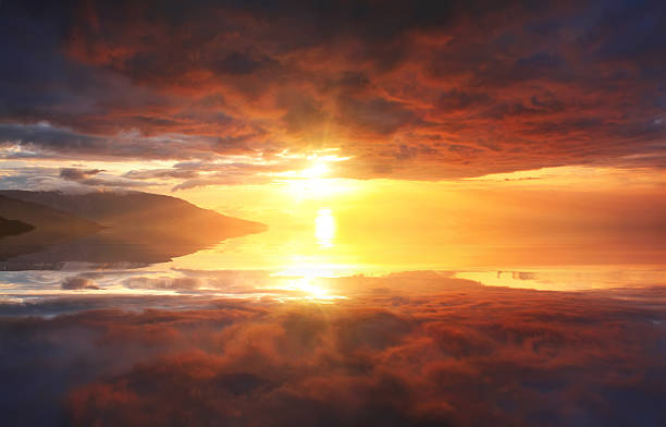 istock Reflection of beautiful sunset sky in the water 537173273