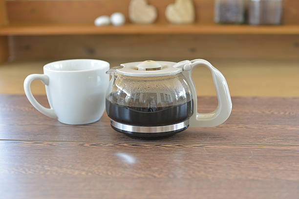 istock cup of coffee with coffee pot 537174761