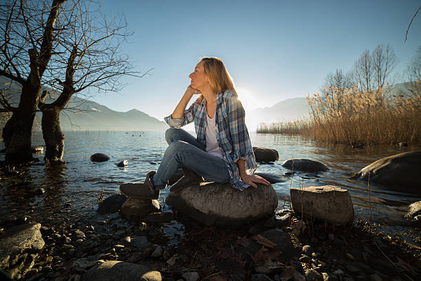 istock Young woman relaxing in nature 537176667