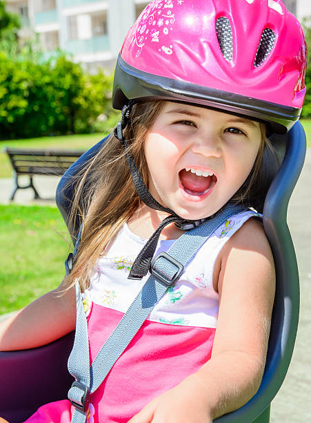 istock Little girl with bicycle helmet 537178469