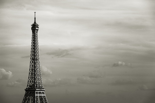 A full shot of the Eiffel Tower, taken in black & white.