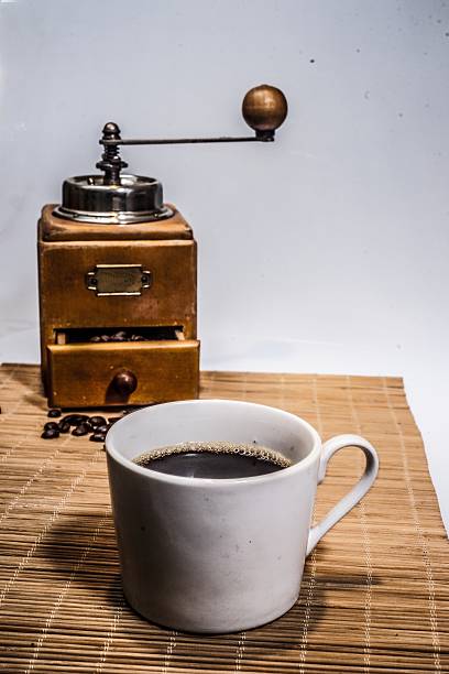 istock cup of coffee with mill for coffee 537184959