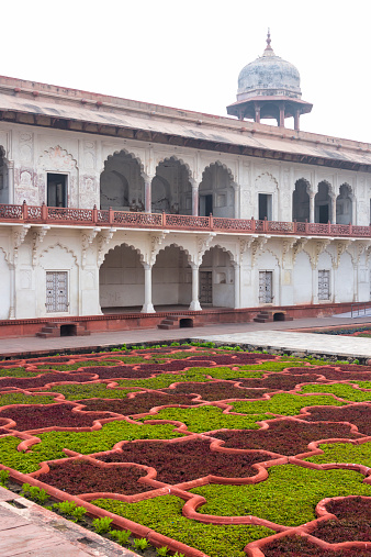 Mogul style white marble palace and formal garden in front. Red Fort, Agra, India