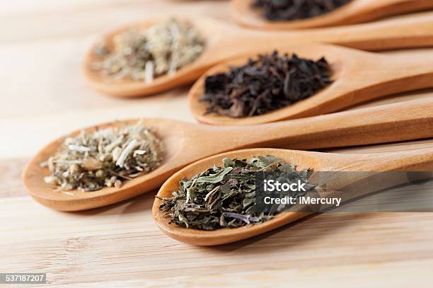 Dry Tea On Spoons Stock Photo - Download Image Now - 2015, Black Color, Camellia sinensis