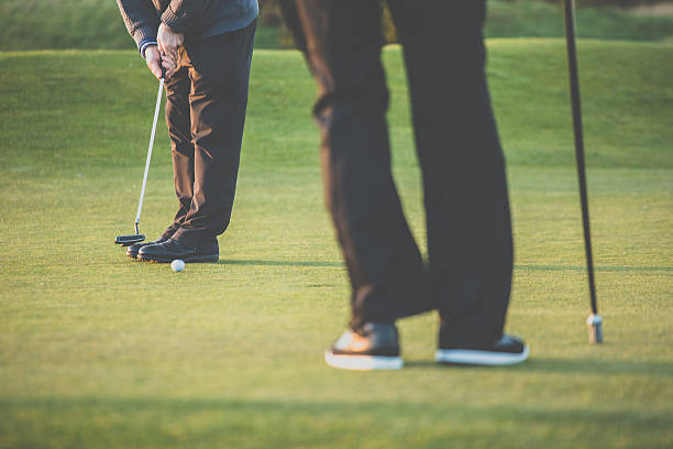istock Golf players on the putting green 537187949