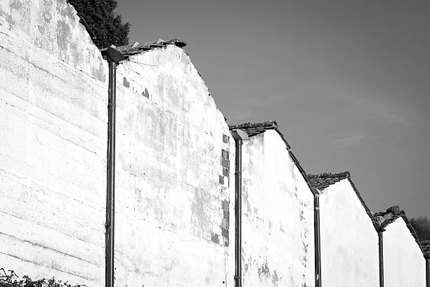 Geometrical wall of a countryside cemetery.