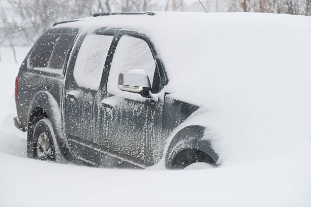 istock Car buried in snow 537190929