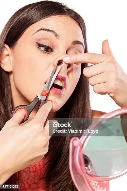 Young Beautiful Woman Cuts Her Nose Hair With Scissors Stock Photo -  Download Image Now - iStock
