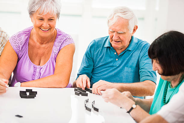 istock Seniors playing dominoes. 537191355