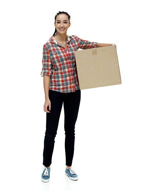 istock Smiling female holding box 537206968