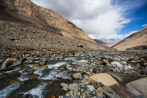 istock river from melting snow in the valley 537209793