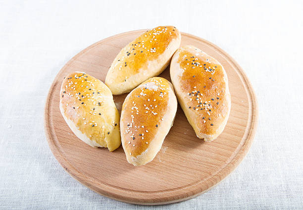 Russian and Ukrainian homemade pattys . Traditional Russian and Ukrainian homemade pattys with filling. brat burger stock pictures, royalty-free photos & images