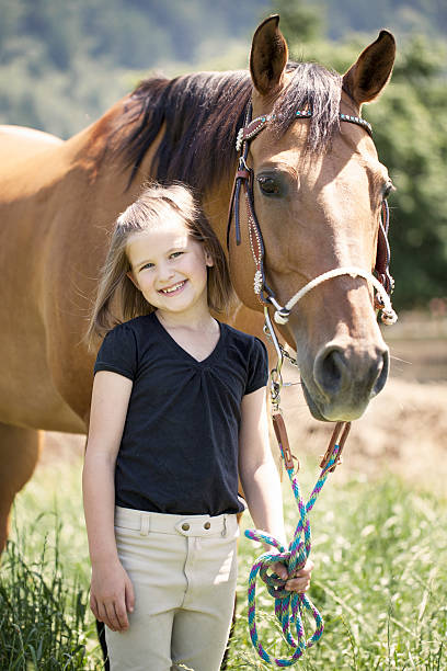 istock Young girl & her horse 537210063