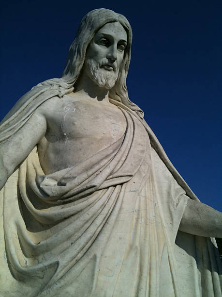 istock Statue of Jesus in a Cemetery 537212149