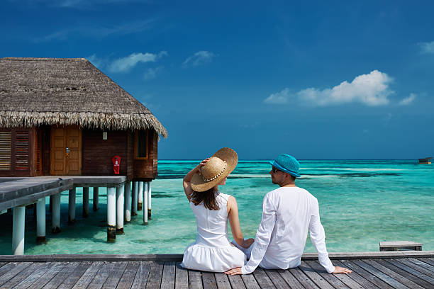 istock Couple on a beach jetty at Maldives 537212453